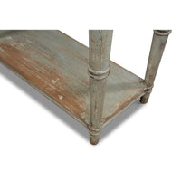 Base shelf and leg design of French Country console table.