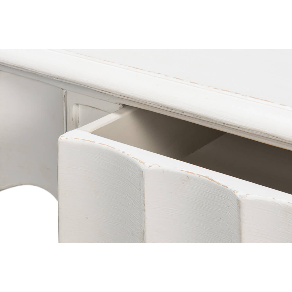 Open drawer close-up, antique white console table.