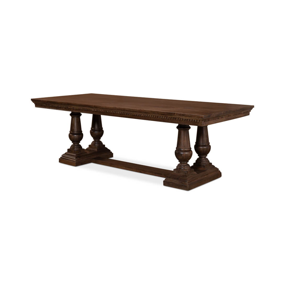 Dark wood dining table angled view, carved detailing.