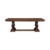 Dining table front view, ornate legs, dark finish.