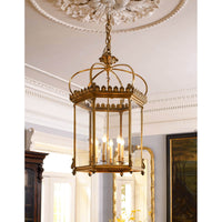 Georgian lantern illuminated in elegant dining room setting.