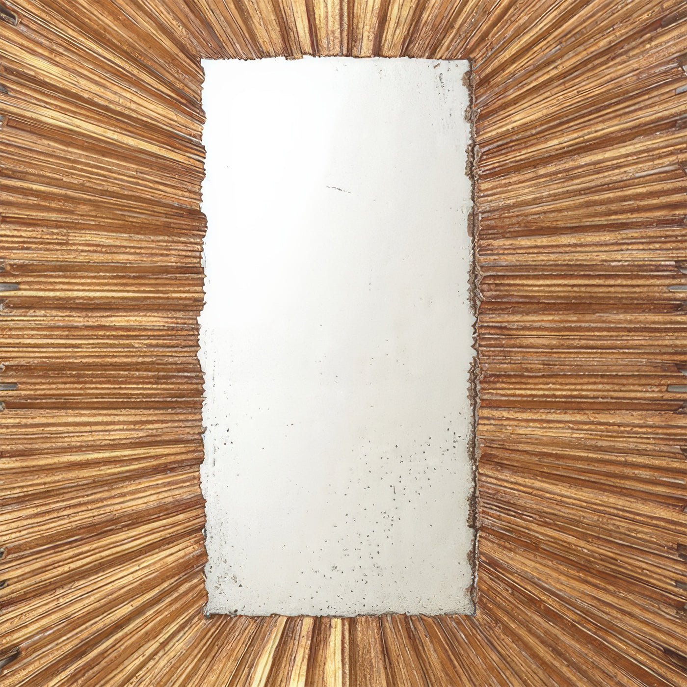 Center of gold sunburst mirror with ornate frame detail.