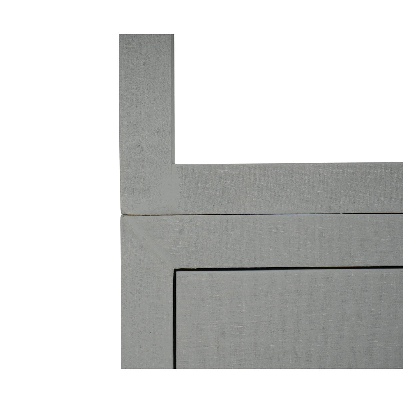 Close-up joint detail of large linen etagere.
