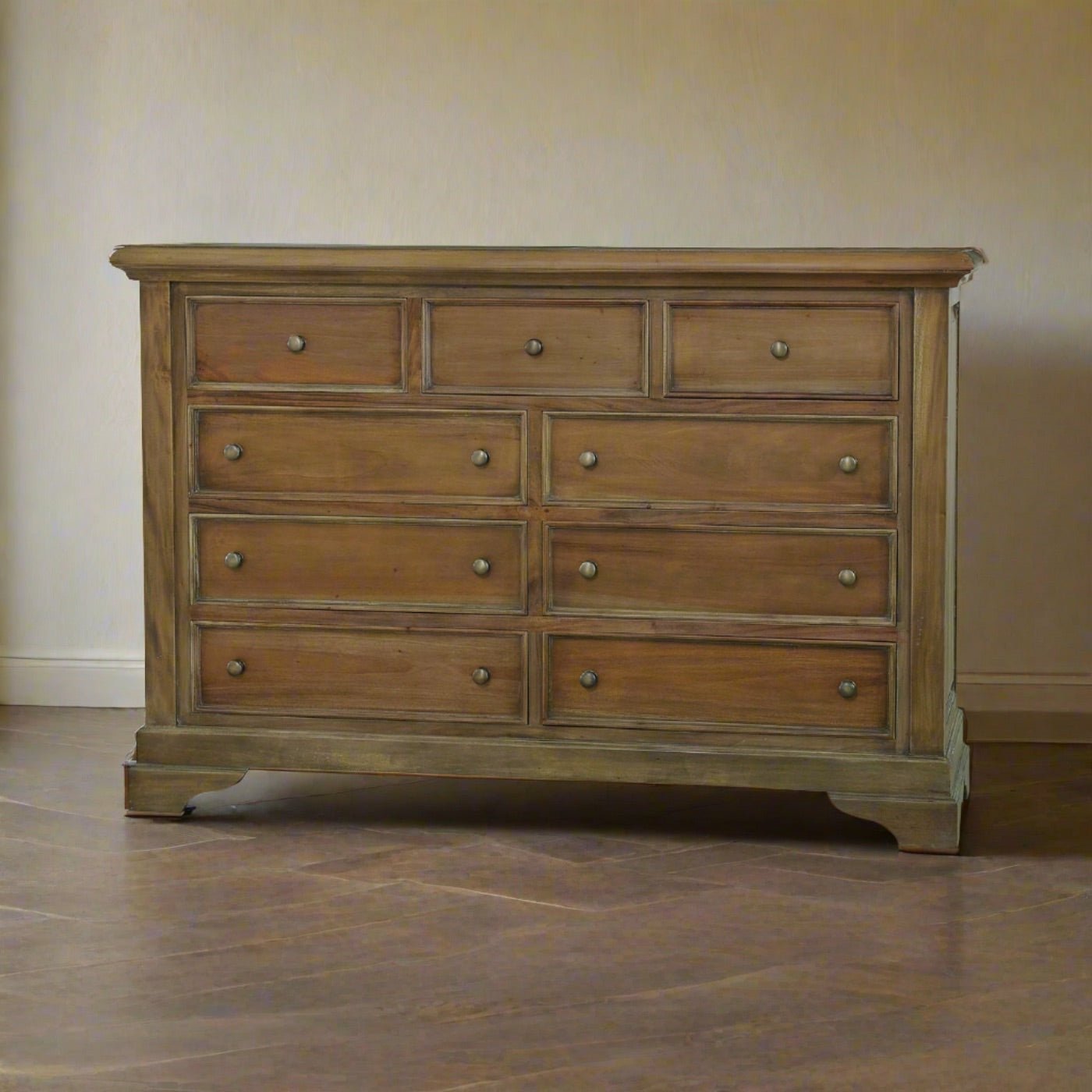 Large mahogany dresser in room setting, wooden floor detail.