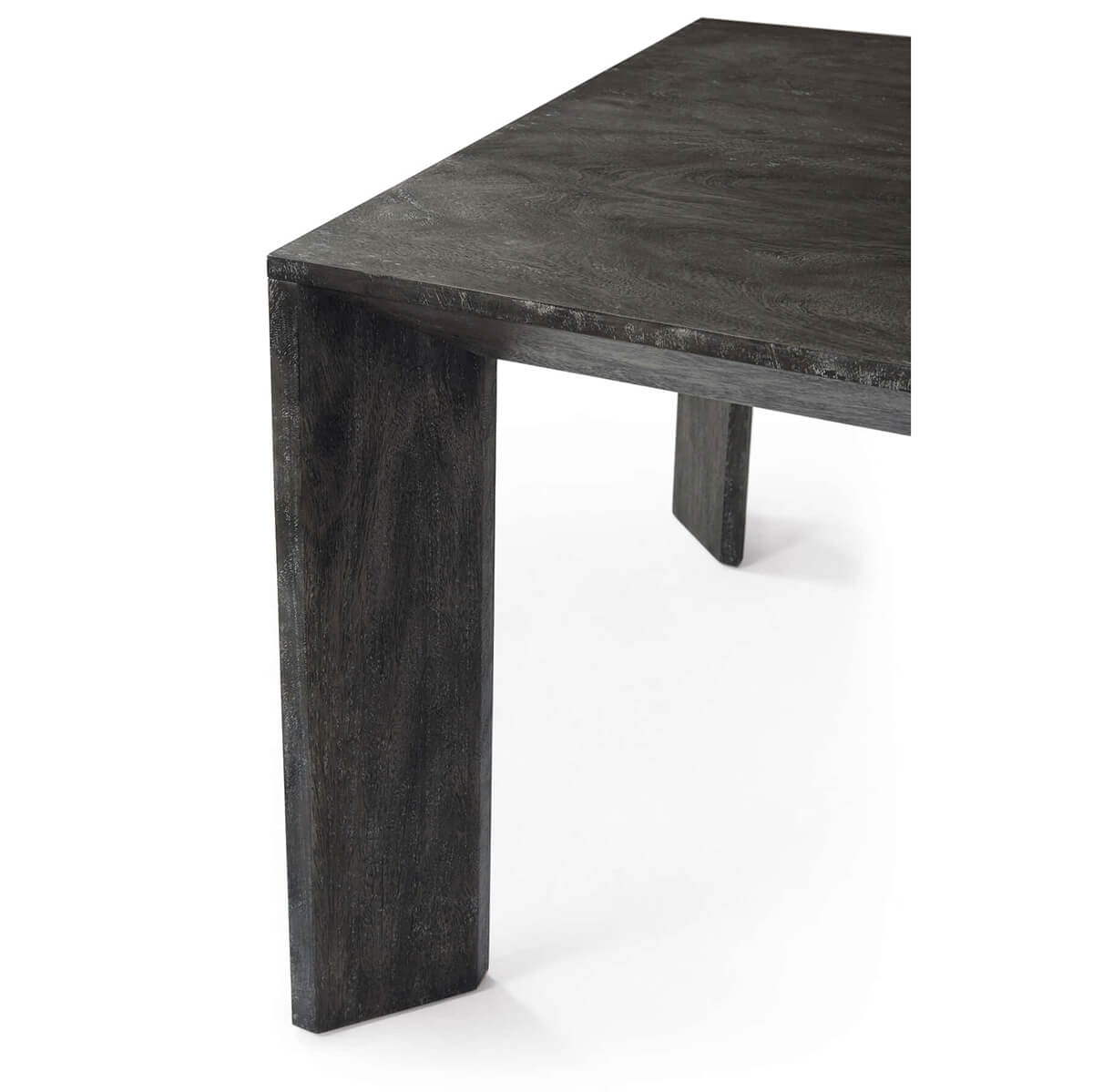 Dining table corner close-up with leg detail.