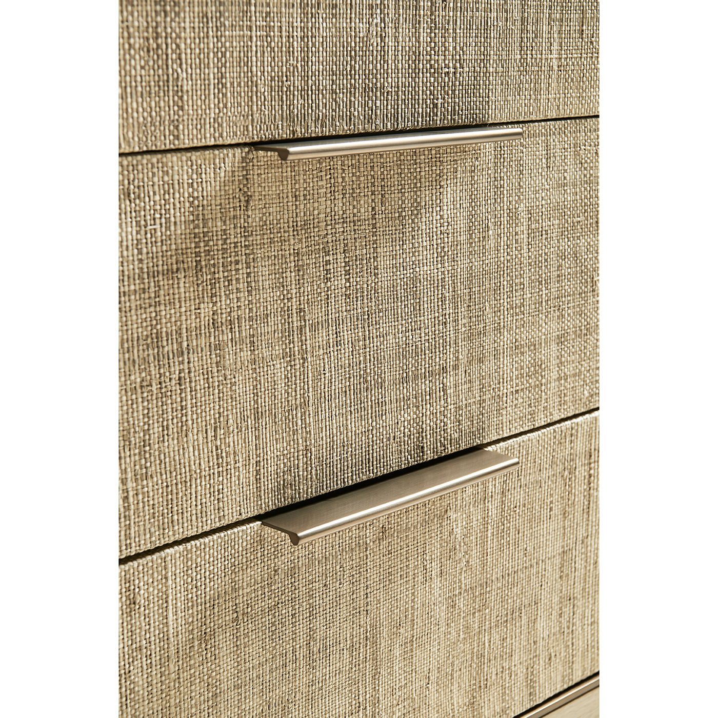 Detailed view of woven texture and handles on nightstand.