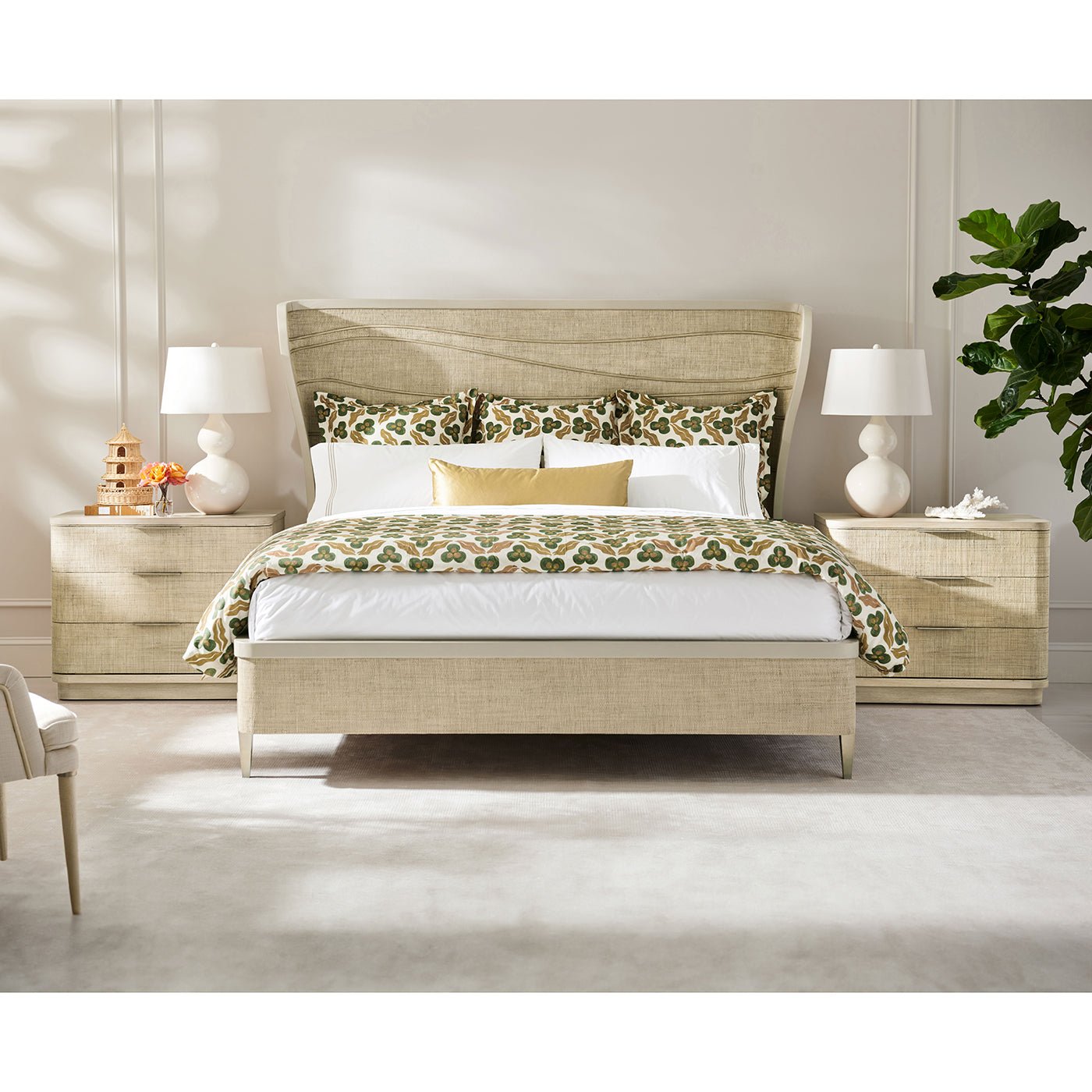Bedroom with bed, nightstands, and decor.