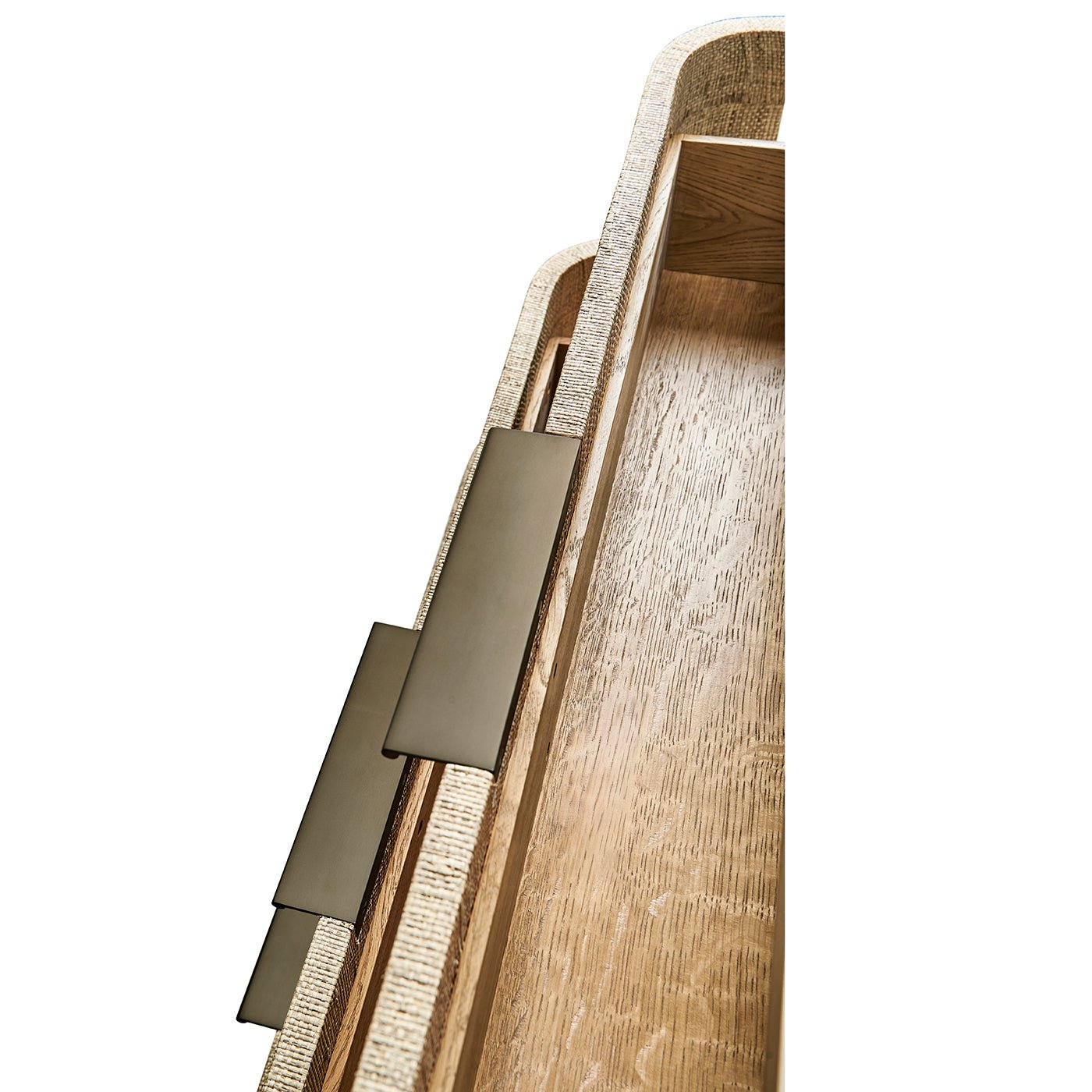 Inside view of open drawer in woven nightstand.