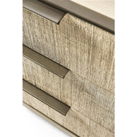 Close-up of drawer handles on woven nightstand.