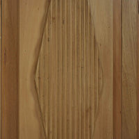 Detailed wood carving on bookcase panel, neoclassic design.