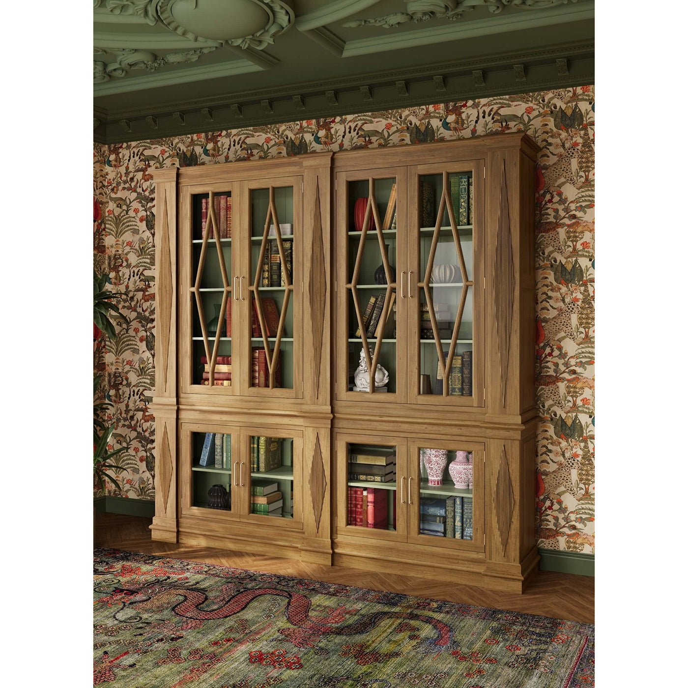 Bookcase in room with vintage wallpaper, styled interior.