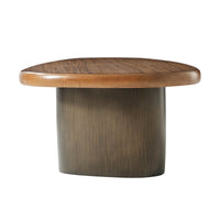 Side view of cocktail table leg and top edge.
