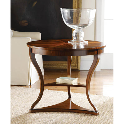Elegant wooden Regency end table with glass bowl display.