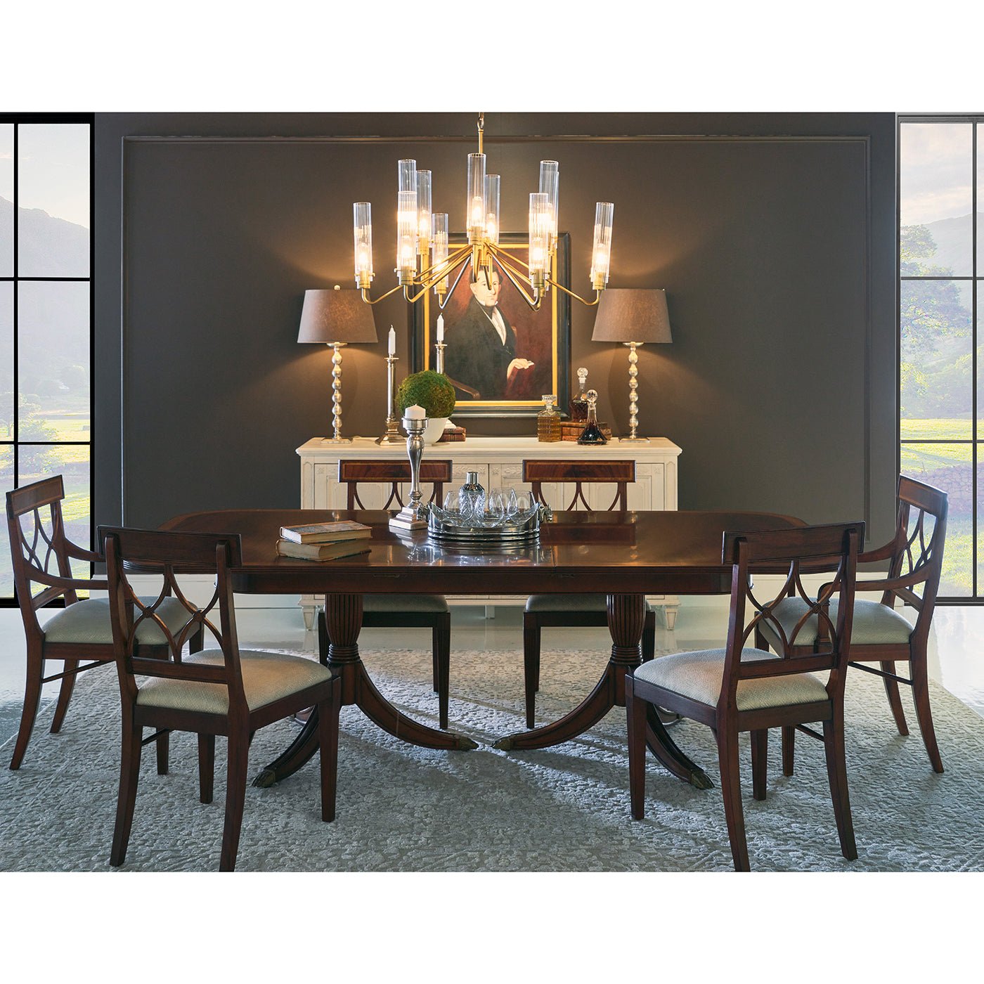 Regency dining table in room setting with chairs.