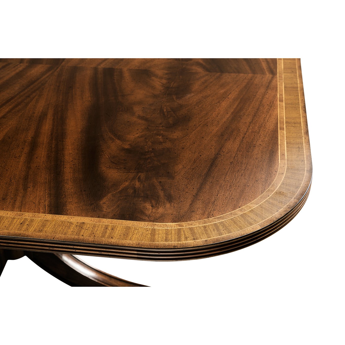 Close-up of Regency dining table edge detail.