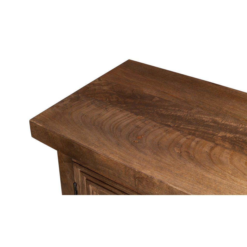 Close-up of rustic sideboard buffet top surface.