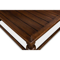 Close-up of tabletop corner, rustic square coffee table.