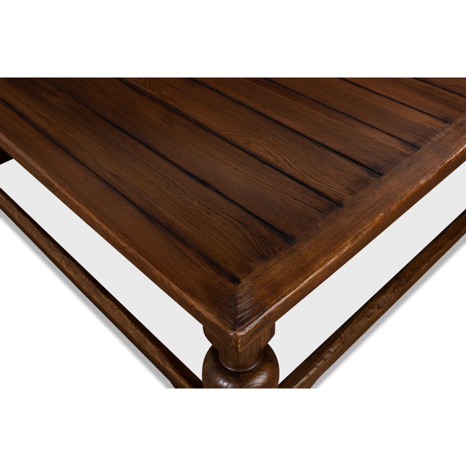 Close-up of tabletop corner, rustic square coffee table.