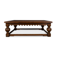 Front profile of rustic square coffee table, showing leg style.