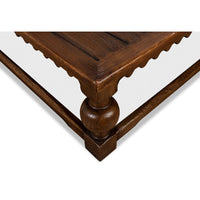 Edge detail of rustic square coffee table, focus on corner.