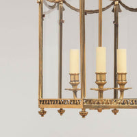 Close-up of lantern's candle holders and base design.