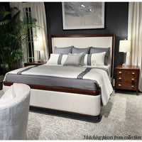 Bedroom with walnut nightstand and matching furniture collection