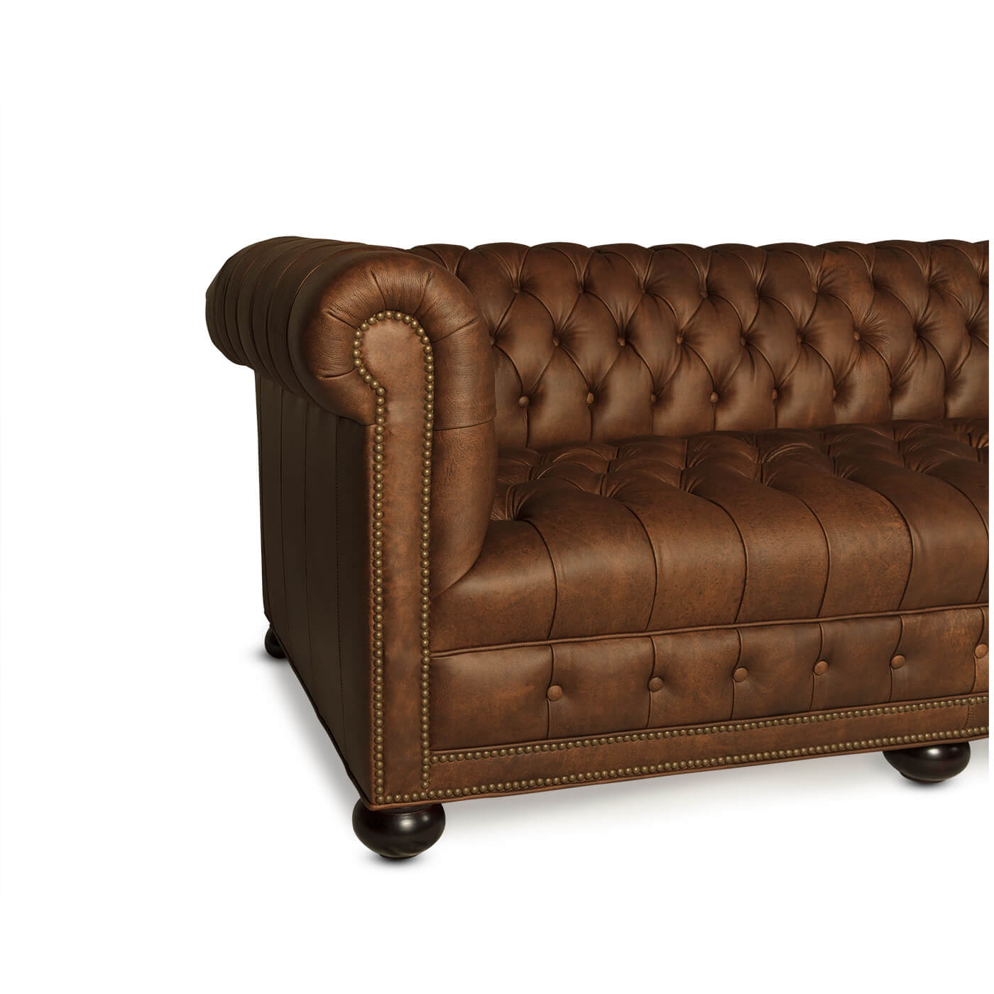 Leather Chesterfield sofa with rolled arm, side angle.