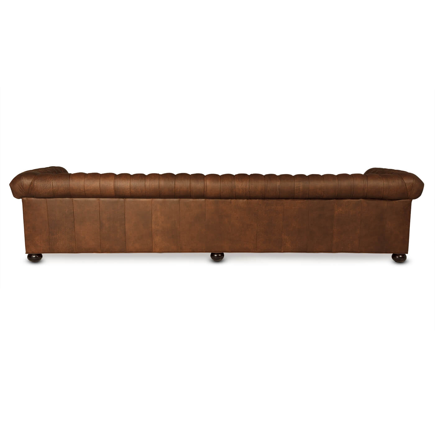 Rear view of four-seater Chesterfield sofa on wooden legs.