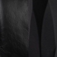 Black leather grain and hammered-iron finish detail for the slim-frame bar stool