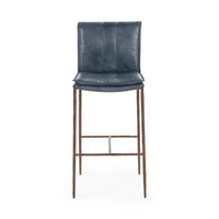 Front view of the slim-frame blue leather bar stool with a padded back, stitched seat and iron footrest