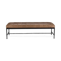 Front view of the brown leather bench showing evenly spaced seat channels and a low black iron stretcher
