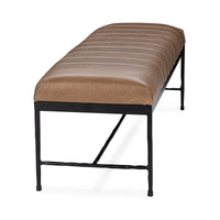 End view of the brown leather bench showing its rounded channeled seat and open iron base