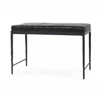 Angled view of the Onyx Black leather bench with a square-stitched seat and hammered iron base
