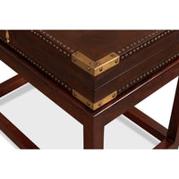 Leather box on stand, metal corner detail.