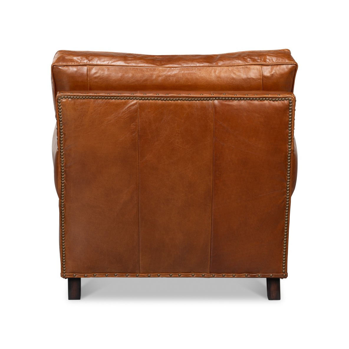 Brown leather club chair, back view.