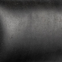 Close-up of the black leather grain and subtle sheen