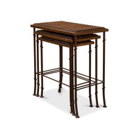 Side perspective of brown nesting tables with metal legs.