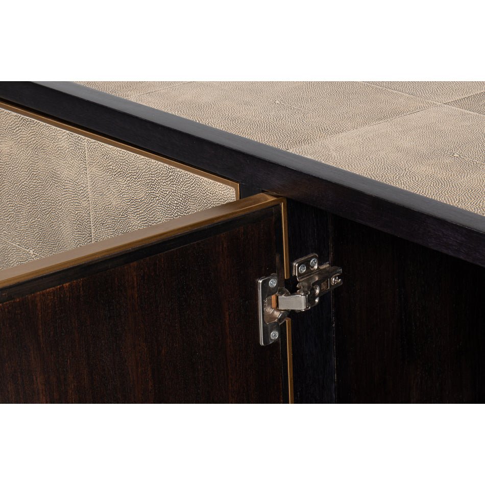 Leather wrapped credenza hinge detail close-up.
