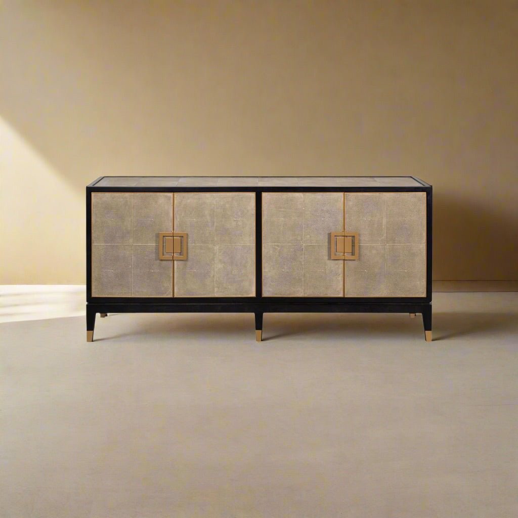 Leather wrapped midcentury credenza in room setting.