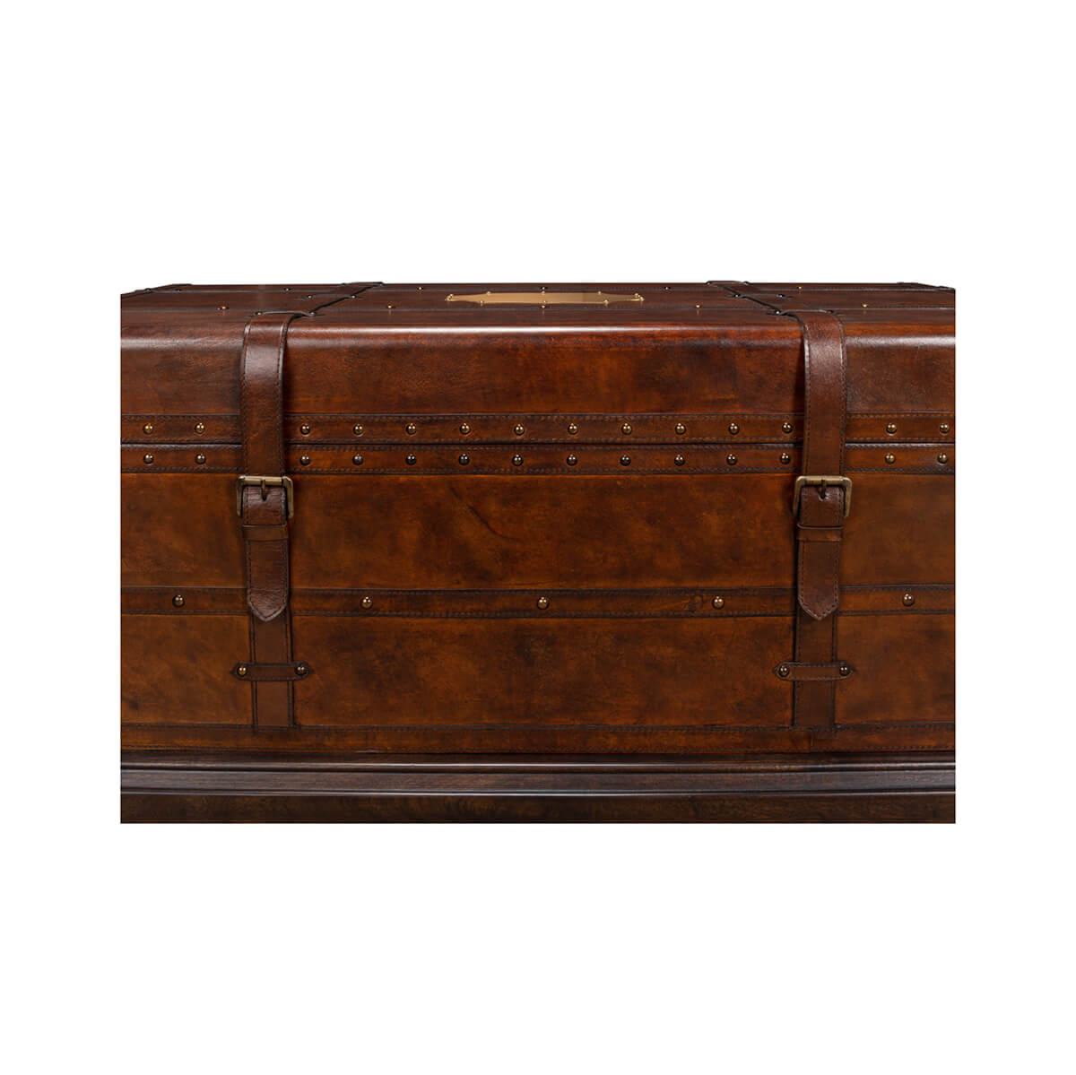 Close-up of rivet details on leather trunk coffee table.