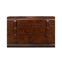 Close-up of rivet details on leather trunk coffee table.