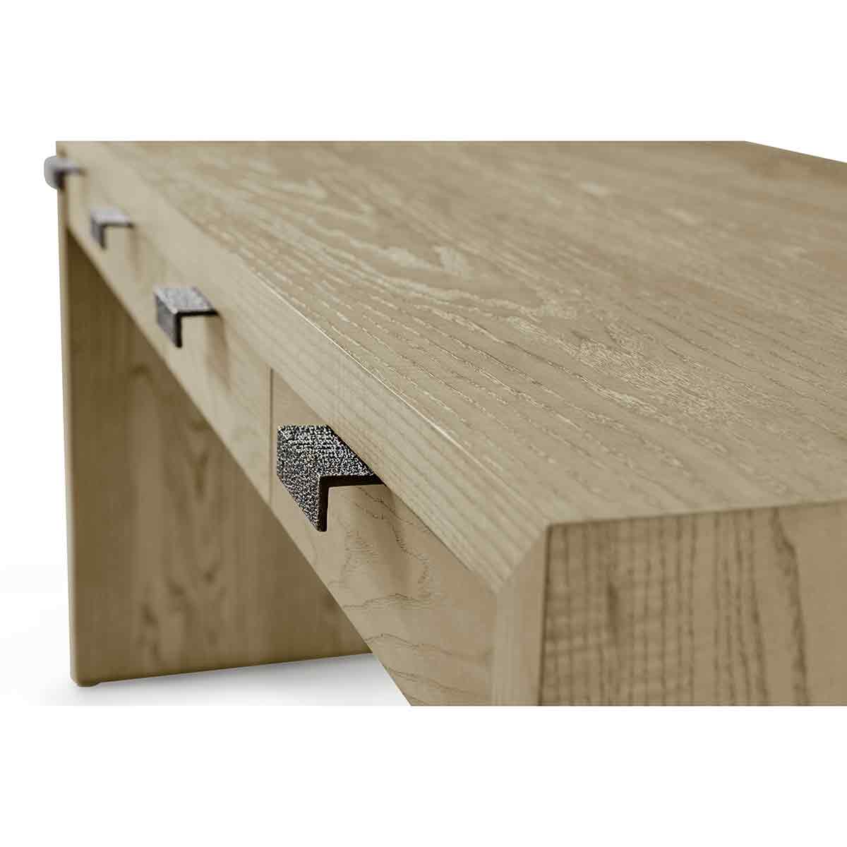 Light ash modern desk drawer handles close-up.