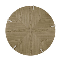 Light ash round coffee table, top view showing wood pattern.