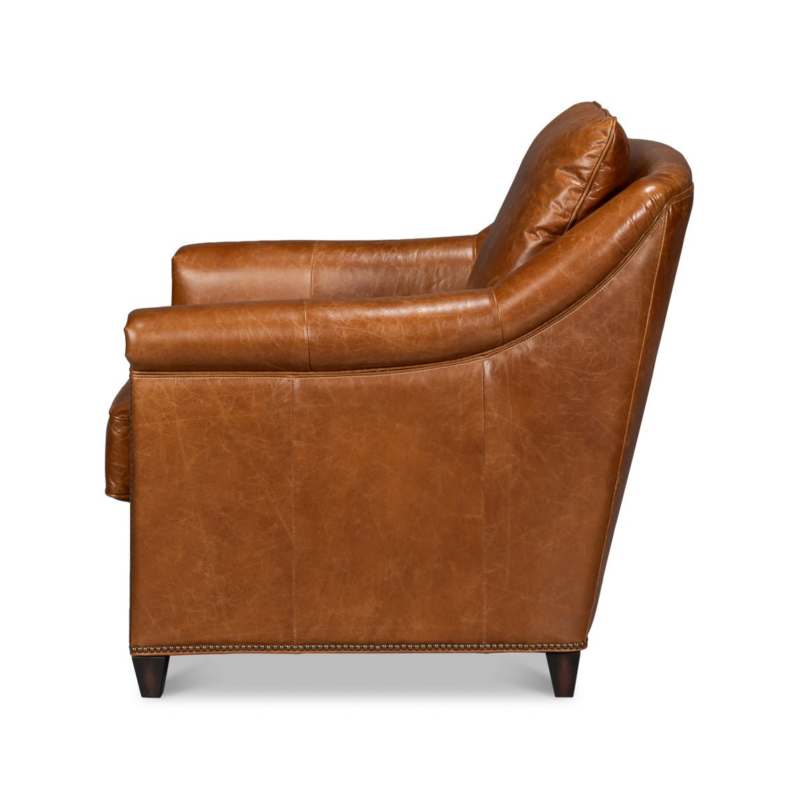 Light brown leather accent chair side profile.