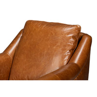 Light brown accent chair cushion and upper details.