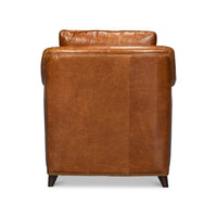 Light brown leather accent chair back view.