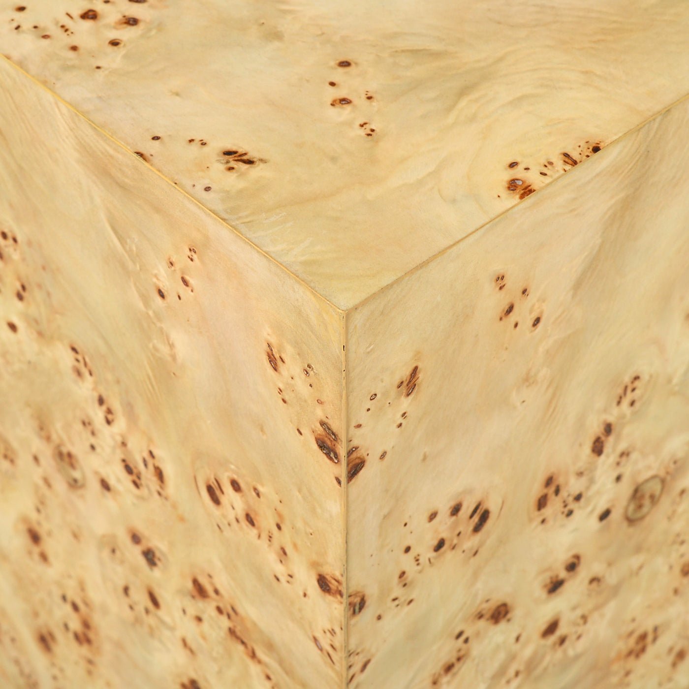 Close-up corner detail burl wood, cube accent table.