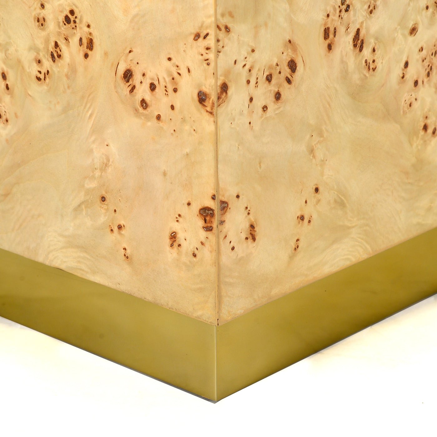 Base detail of light burl wood cube accent table.