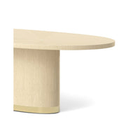 Oval dining table, close-up corner detail.