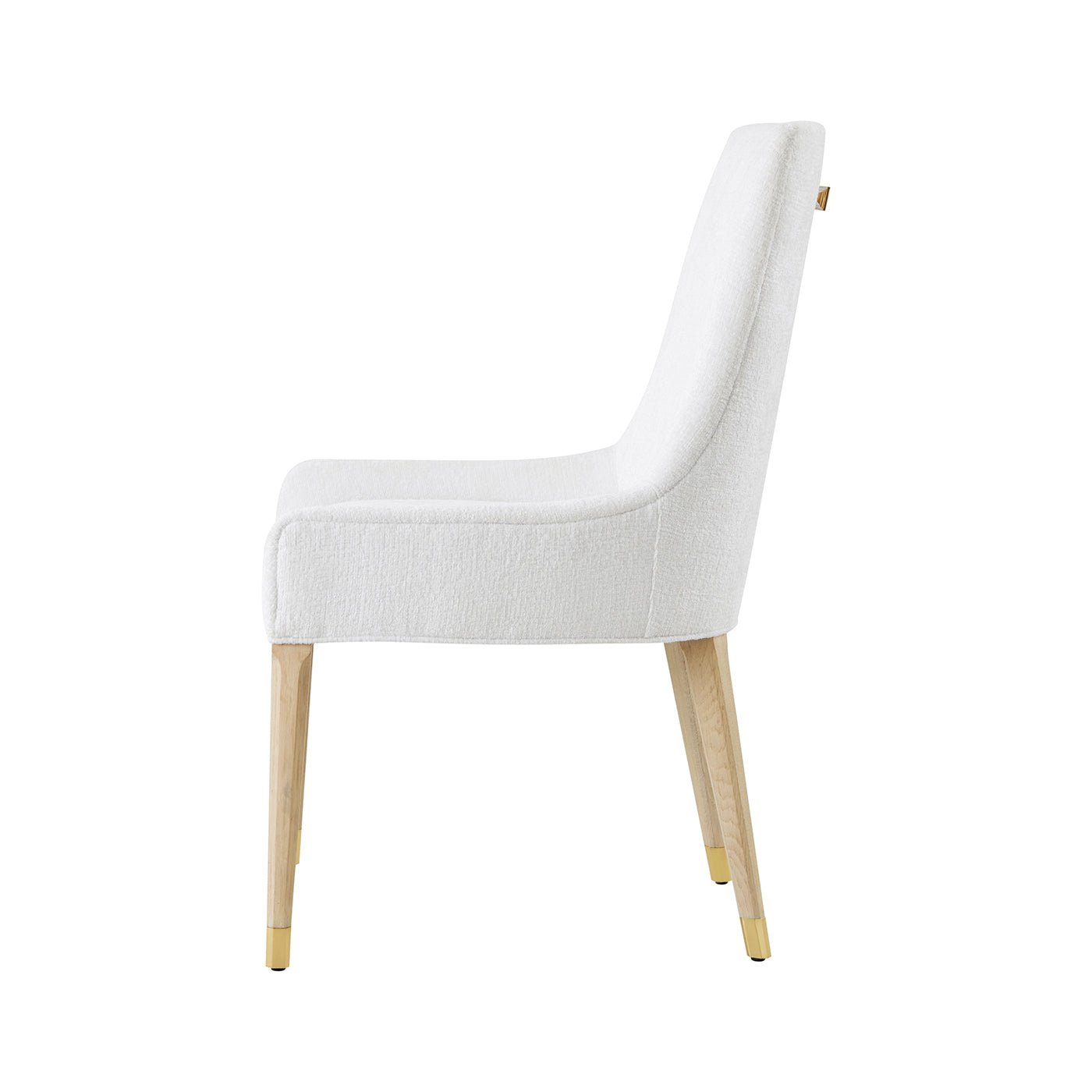 White dining chair, side profile with wooden legs.